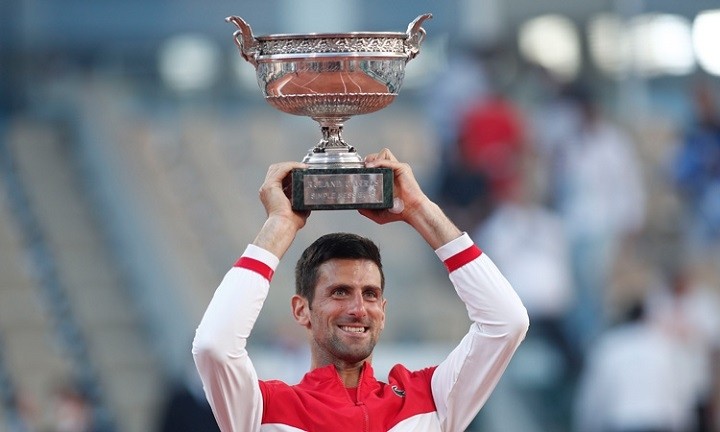 Novak Djokovic celebrates with the trophy after winning the French Open against Stefanos Tsitsipas in Paris on Sunday. (Photo: Reuters)